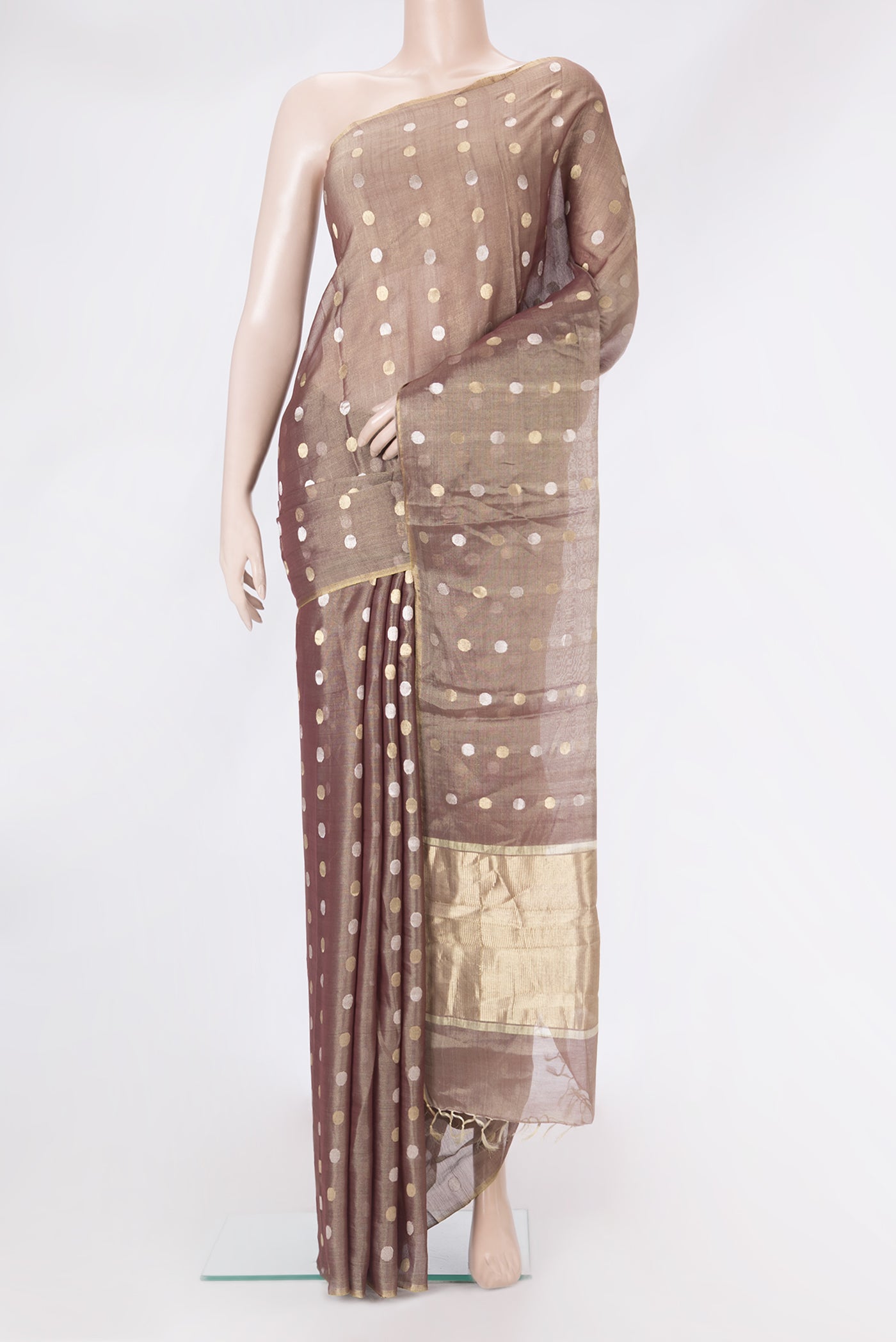 Brown Dual Tone Tussar Silk Saree with Zari Butta on the body and Thin Zari Line.  displayed on a mannequin