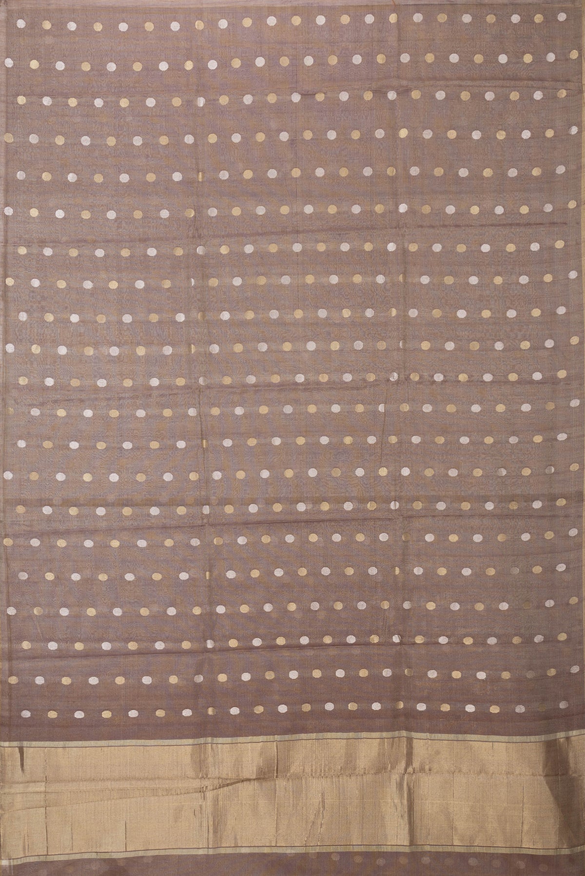 Flat view of Brown Dual Tone Tussar Silk Saree with Zari Butta on the body and Thin Zari Line. 