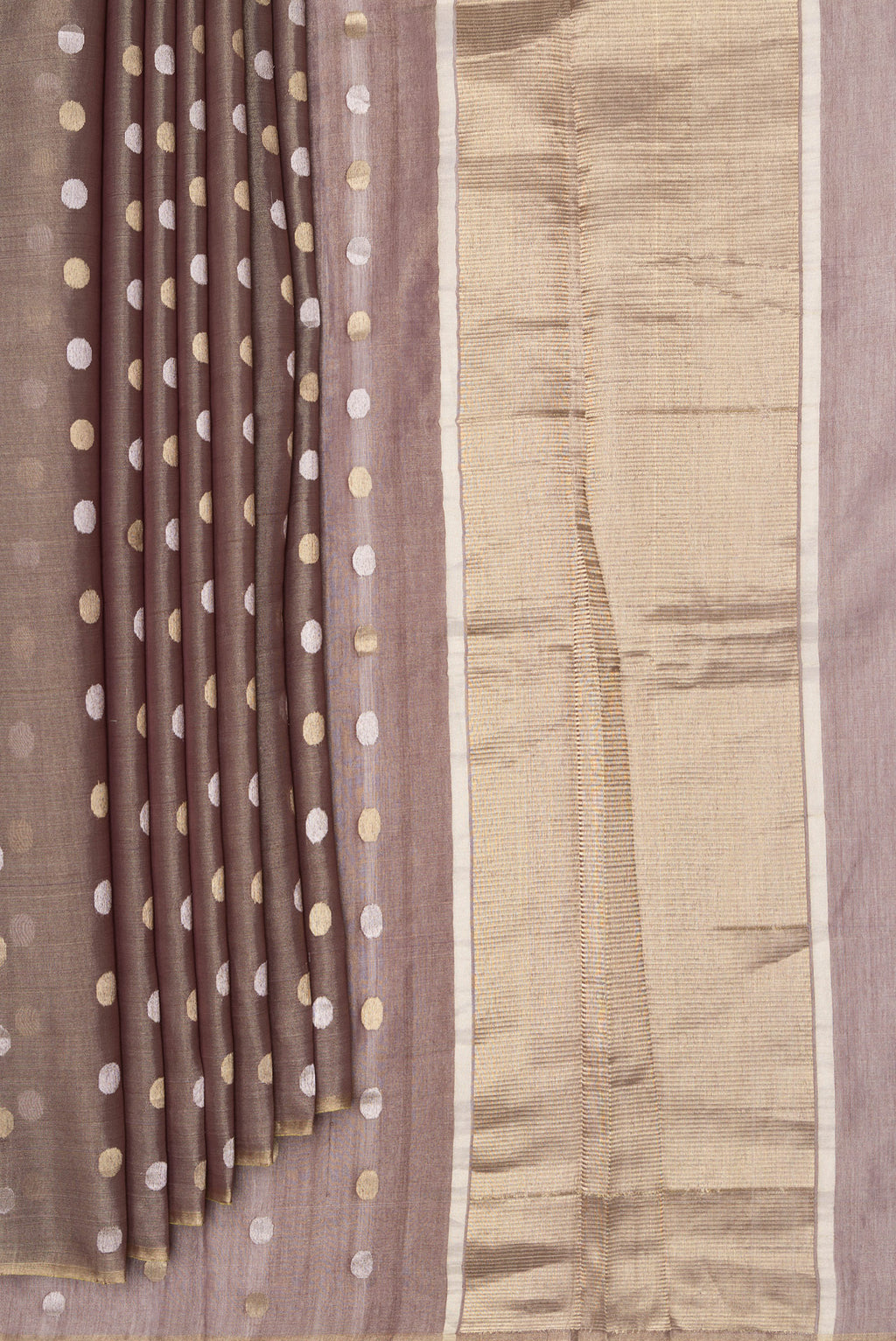 Pleats and pallu of Brown Dual Tone Tussar Silk Saree with Zari Butta on the body and Thin Zari Line. 