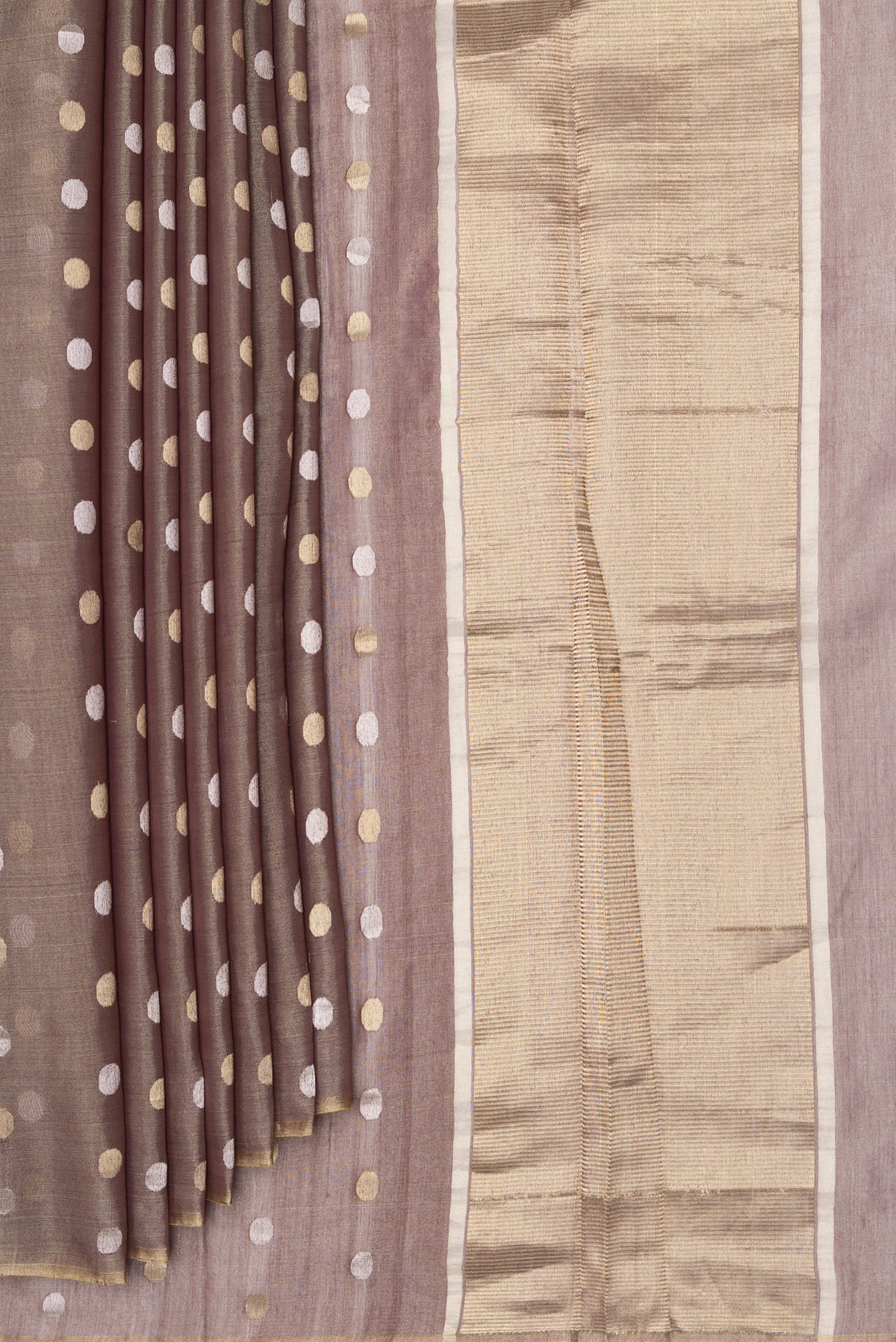 Pleats and pallu of Brown Dual Tone Tussar Silk Saree with Zari Butta on the body and Thin Zari Line. 