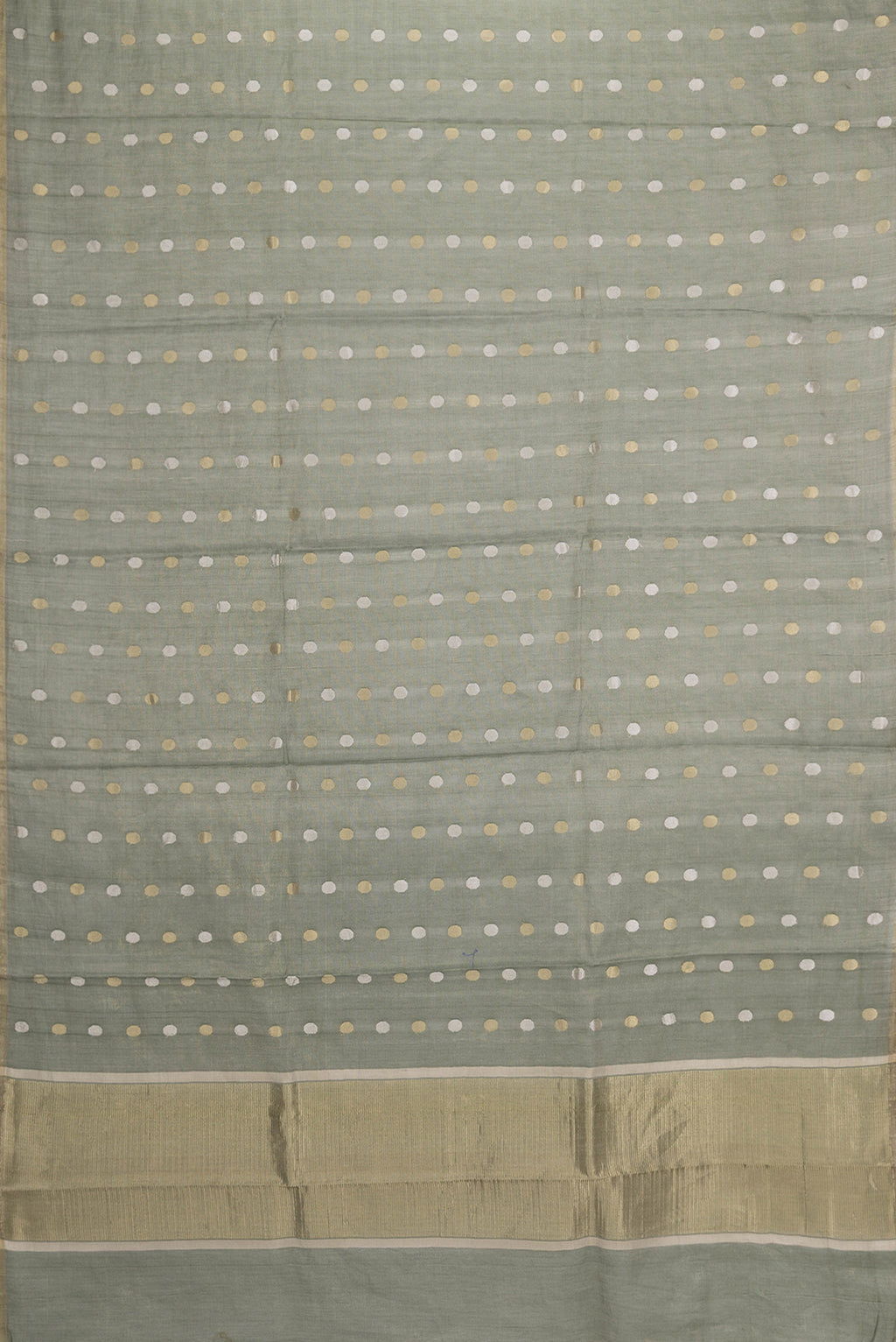 Flat view of Bottle Green Dual Tone Chanderi Silk Saree with Zari Butta on the body and Thin Zari Line. 