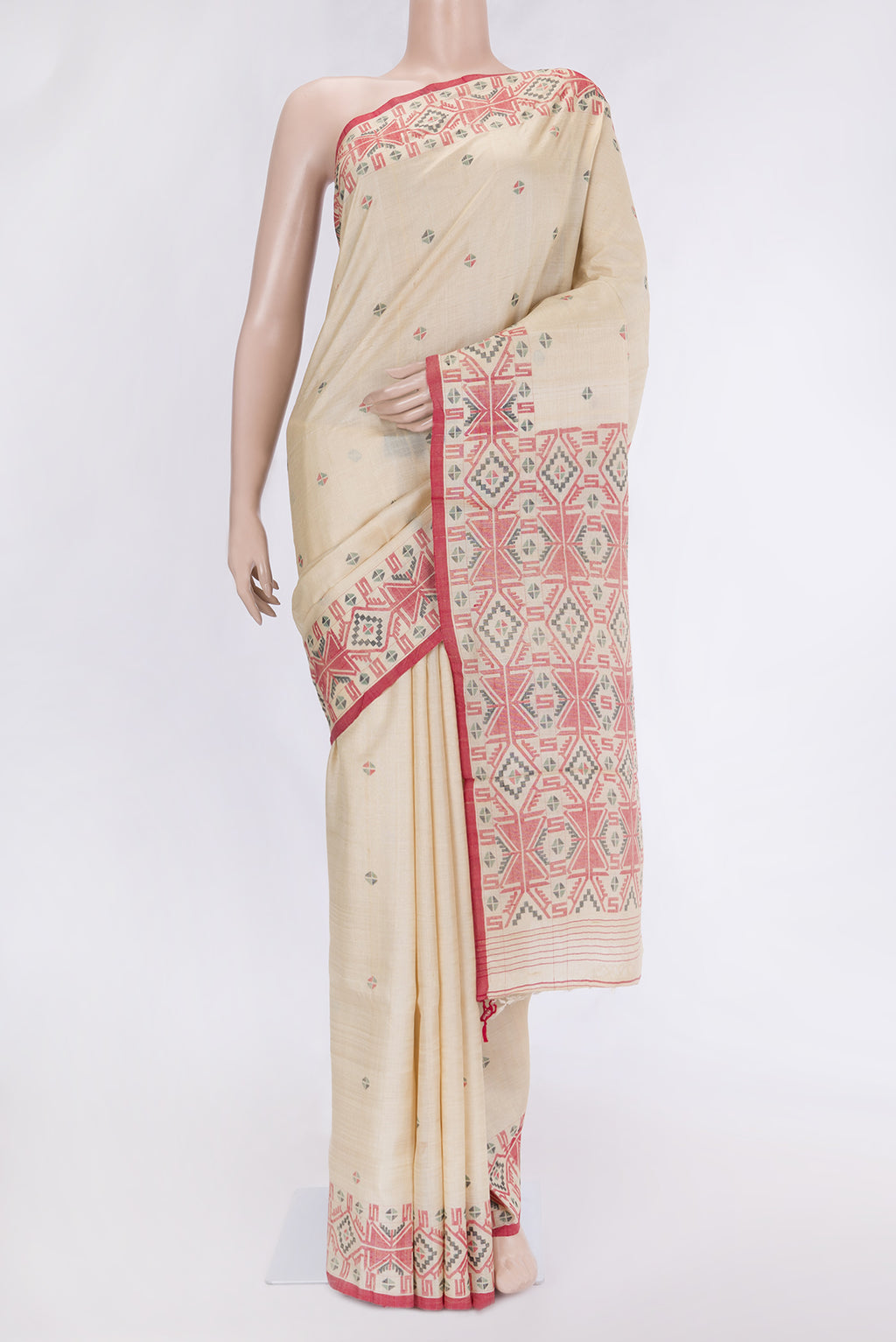 Beige Dual Tone Tussar Silk Saree with Thread Butta on the body and Thread Border.  displayed on a mannequin