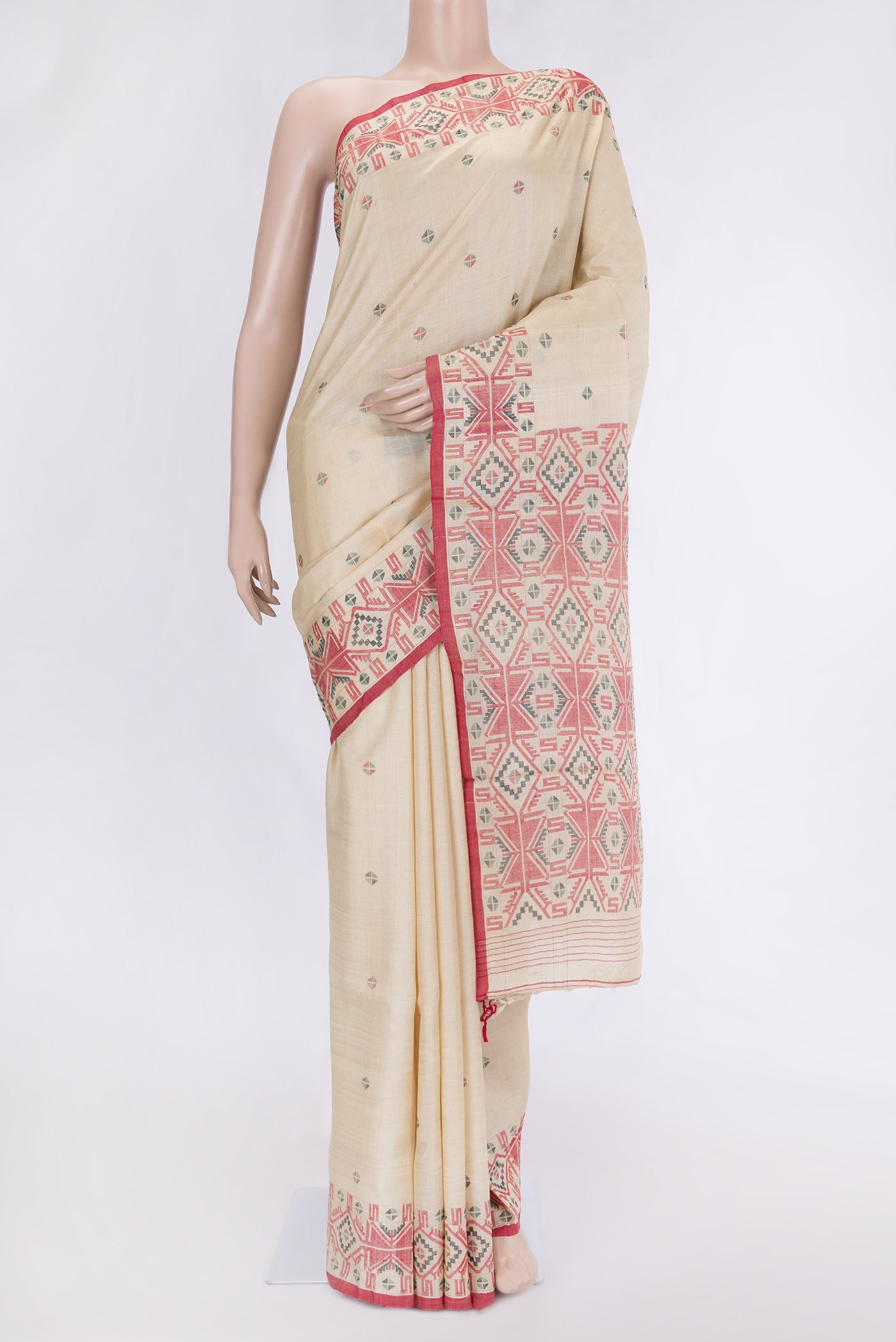 Beige Dual Tone Tussar Silk Saree with Thread Butta on the body and Thread Border.  displayed on a mannequin