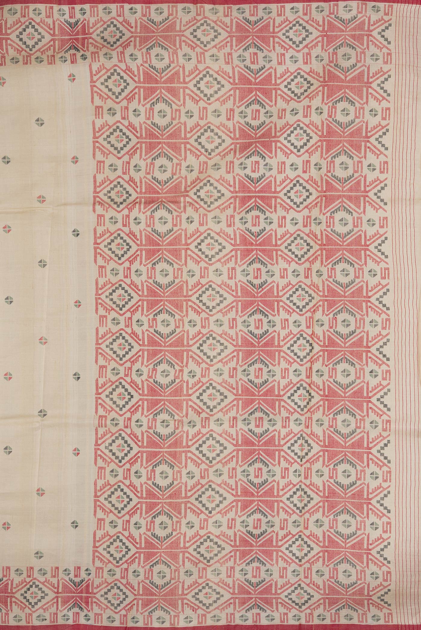 Close up image of the pallu of Beige Dual Tone Tussar Silk Saree with Thread Butta on the body and Thread Border. 