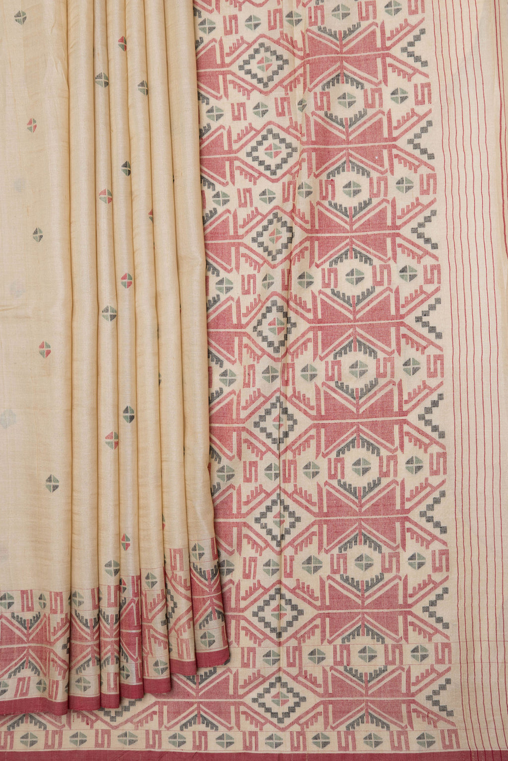 Pleats and pallu of Beige Dual Tone Tussar Silk Saree with Thread Butta on the body and Thread Border. 