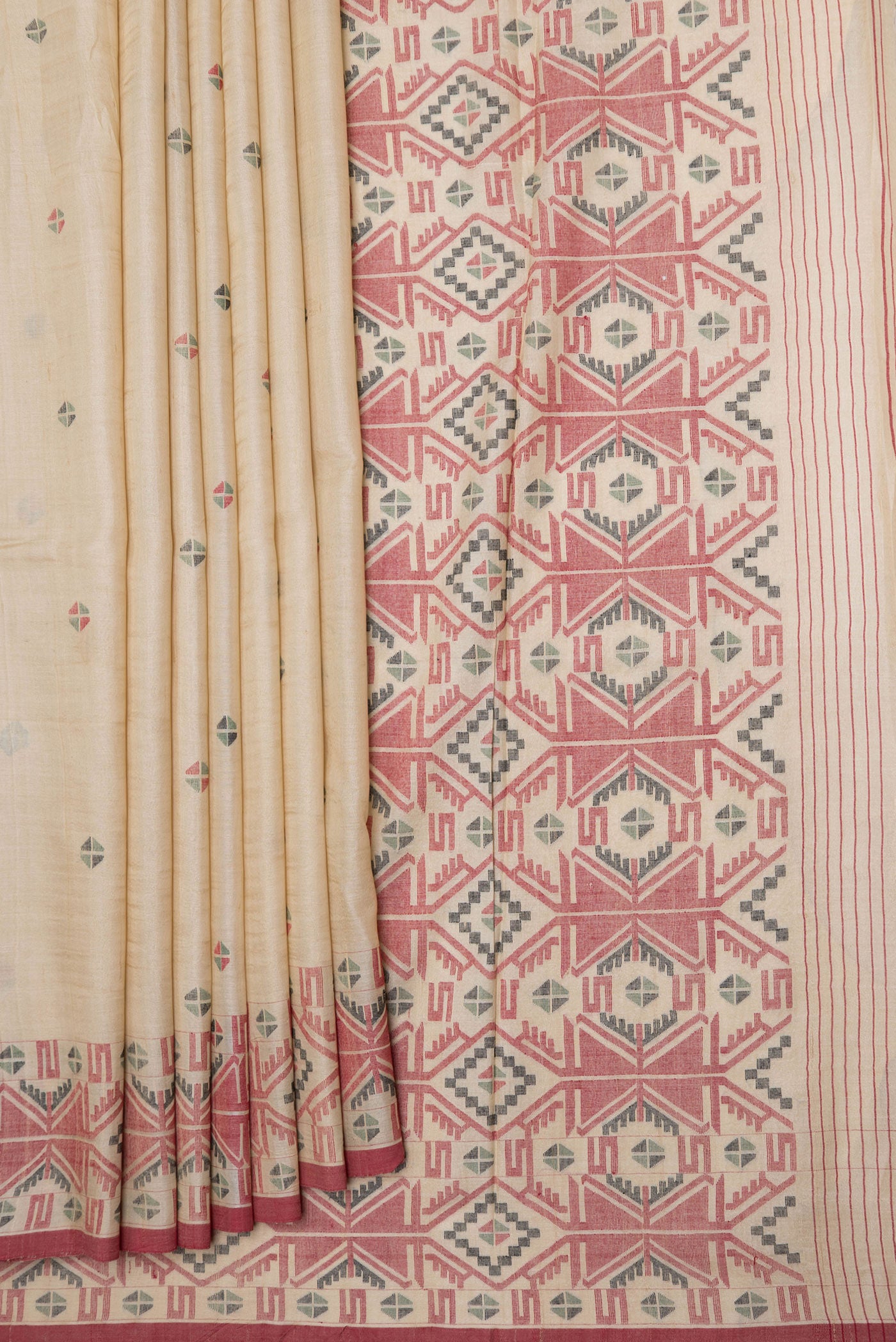 Pleats and pallu of Beige Dual Tone Tussar Silk Saree with Thread Butta on the body and Thread Border. 