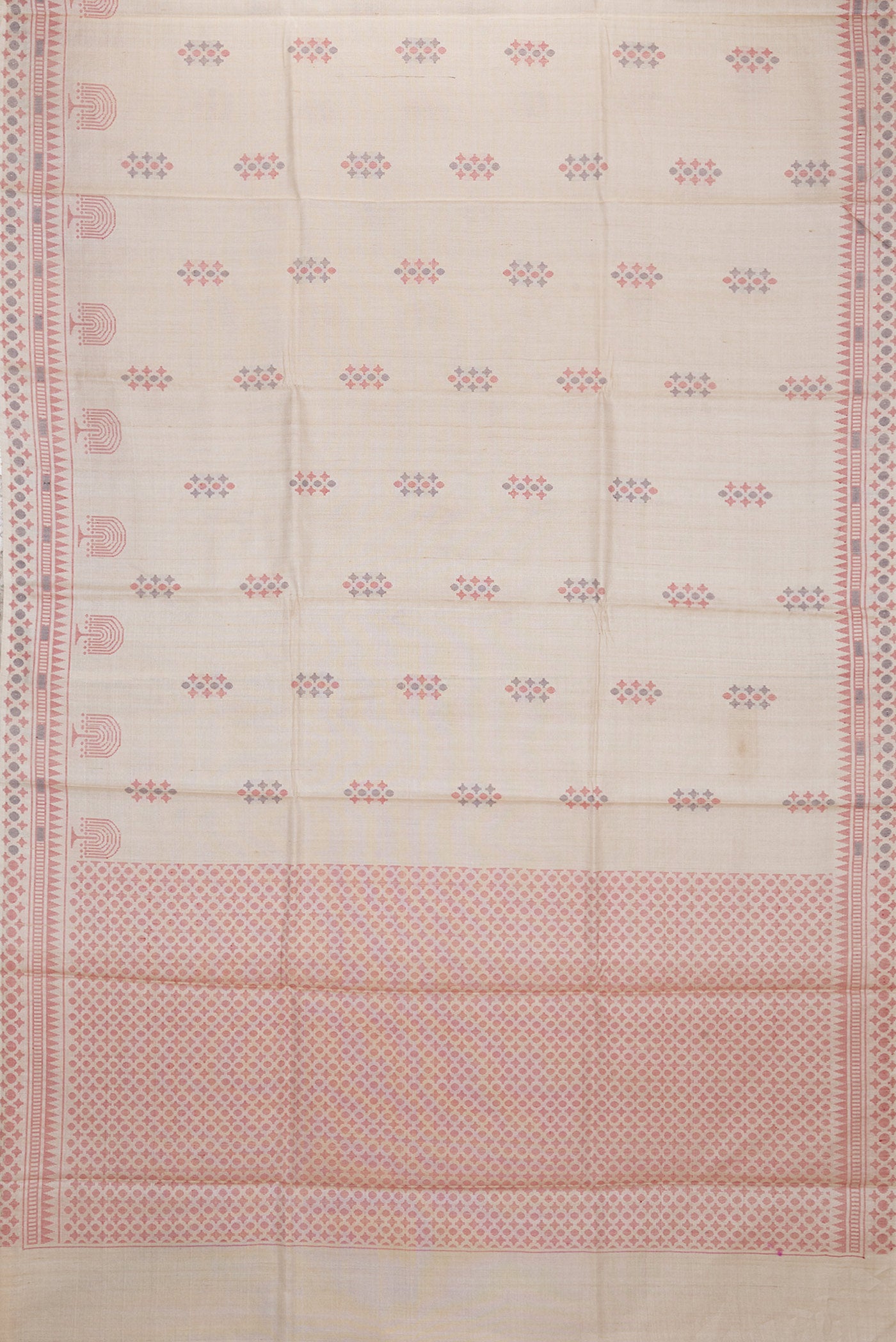 Flat view of Beige Dual Tone Tussar Silk Saree with Thread Butta on the body and Thread Border. 