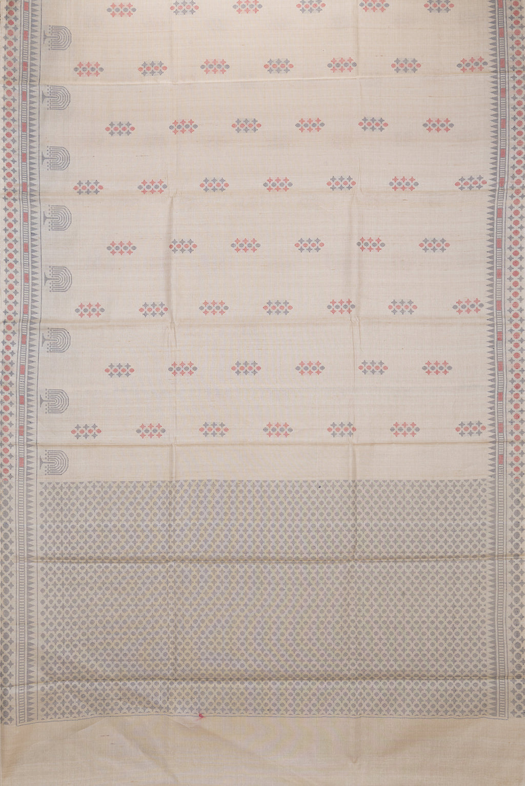 Flat view of Beige Dual Tone Tussar Silk Saree with Thread Butta on the body and Thread Border. 