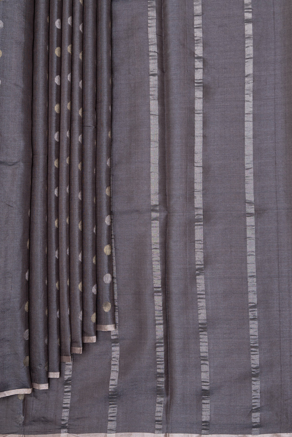 Pleats and pallu of Grey Dual Tone Tussar Silk Saree with Zari Butta on the body and Zari Border. 