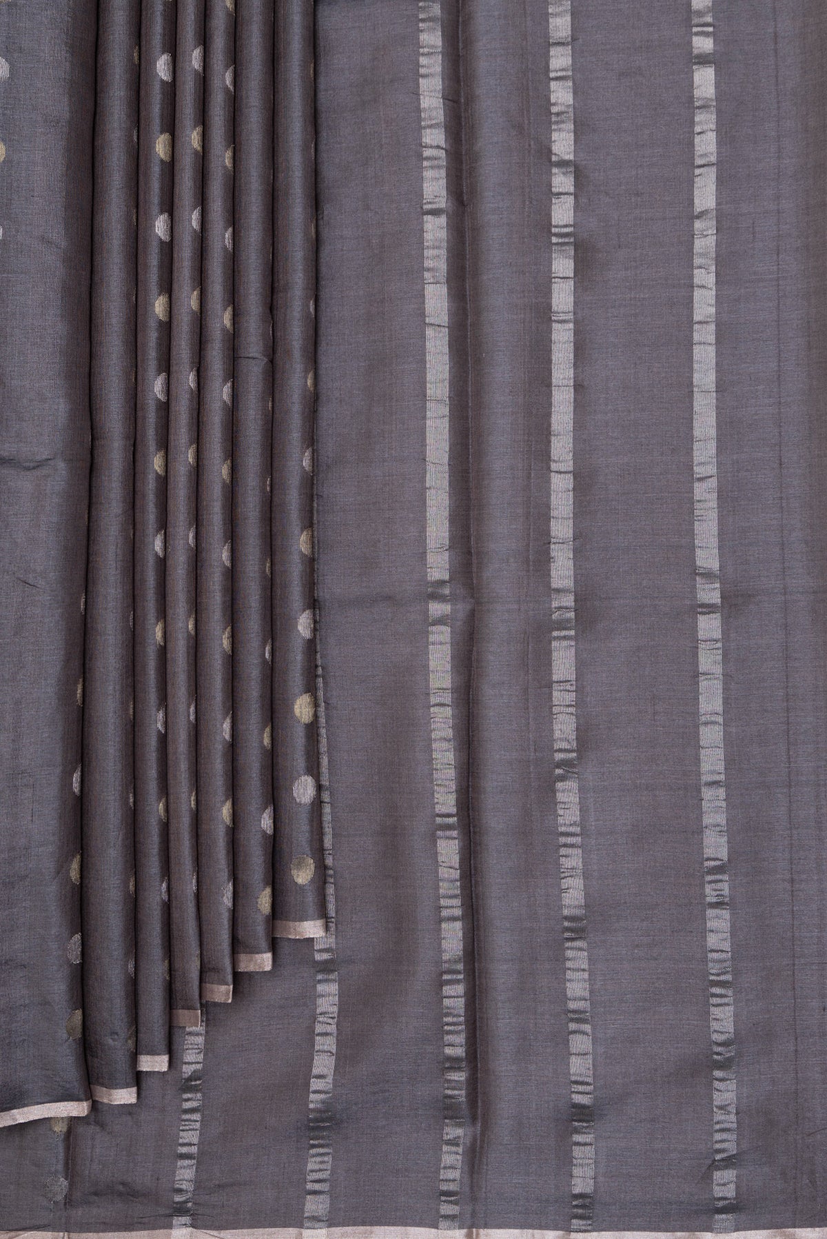 Pleats and pallu of Grey Dual Tone Tussar Silk Saree with Zari Butta on the body and Zari Border. 