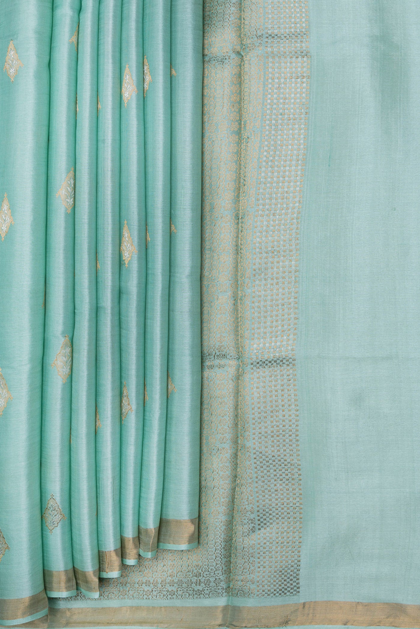 Pleats and pallu of Sea Green Dual Tone Tussar Silk Saree with Zari Butta on the body and Zari Border. 