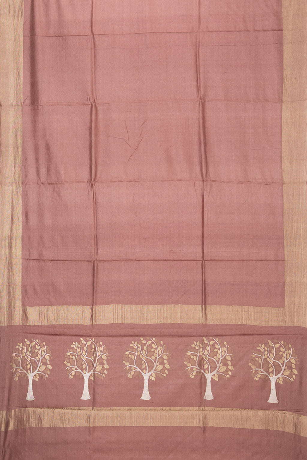 Flat view of Brown Tussar Silk Saree with Plain Body and Zari Border. 