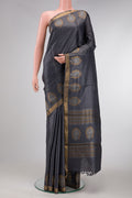 Grey Dual Tone Tussar Silk Saree with Plain Body and Fancy Border.  displayed on a mannequin