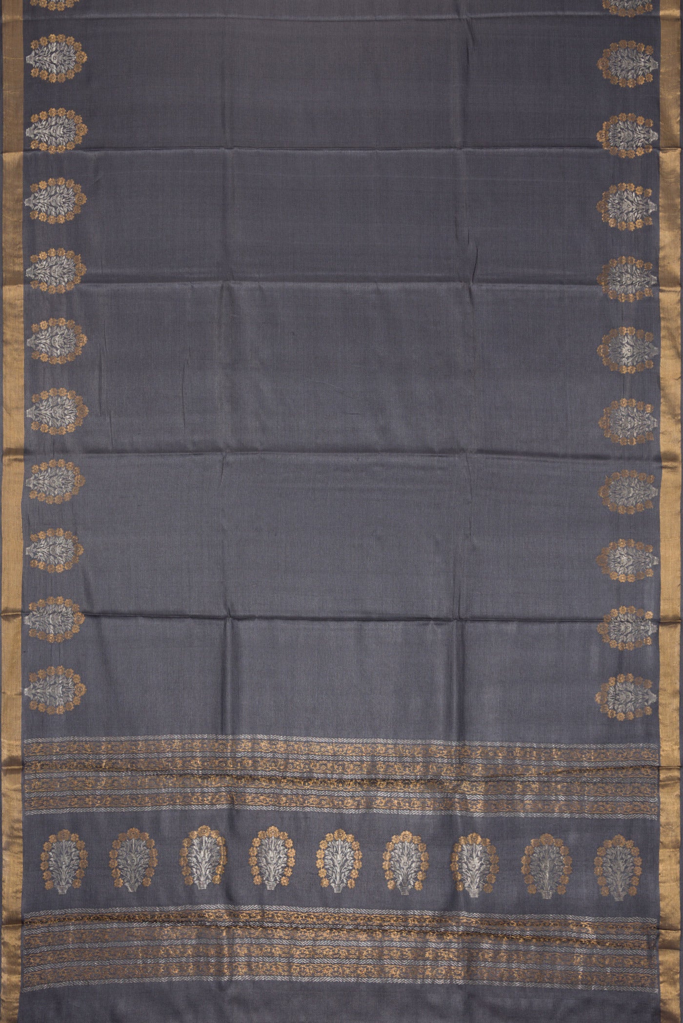 Flat view of Grey Dual Tone Tussar Silk Saree with Plain Body and Fancy Border. 