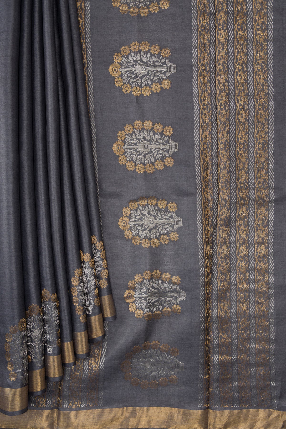 Pleats and pallu of Grey Dual Tone Tussar Silk Saree with Plain Body and Fancy Border. 
