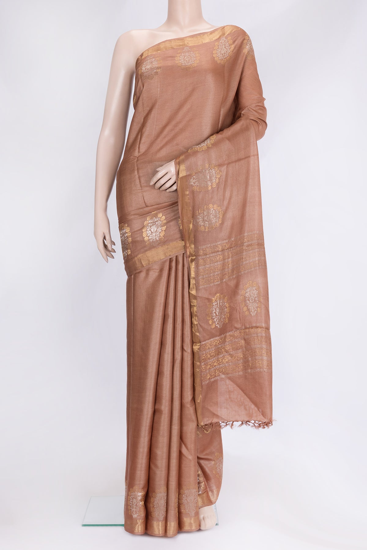 Brown Dual Tone Tussar Silk Saree with Plain Body and Fancy Border.  displayed on a mannequin