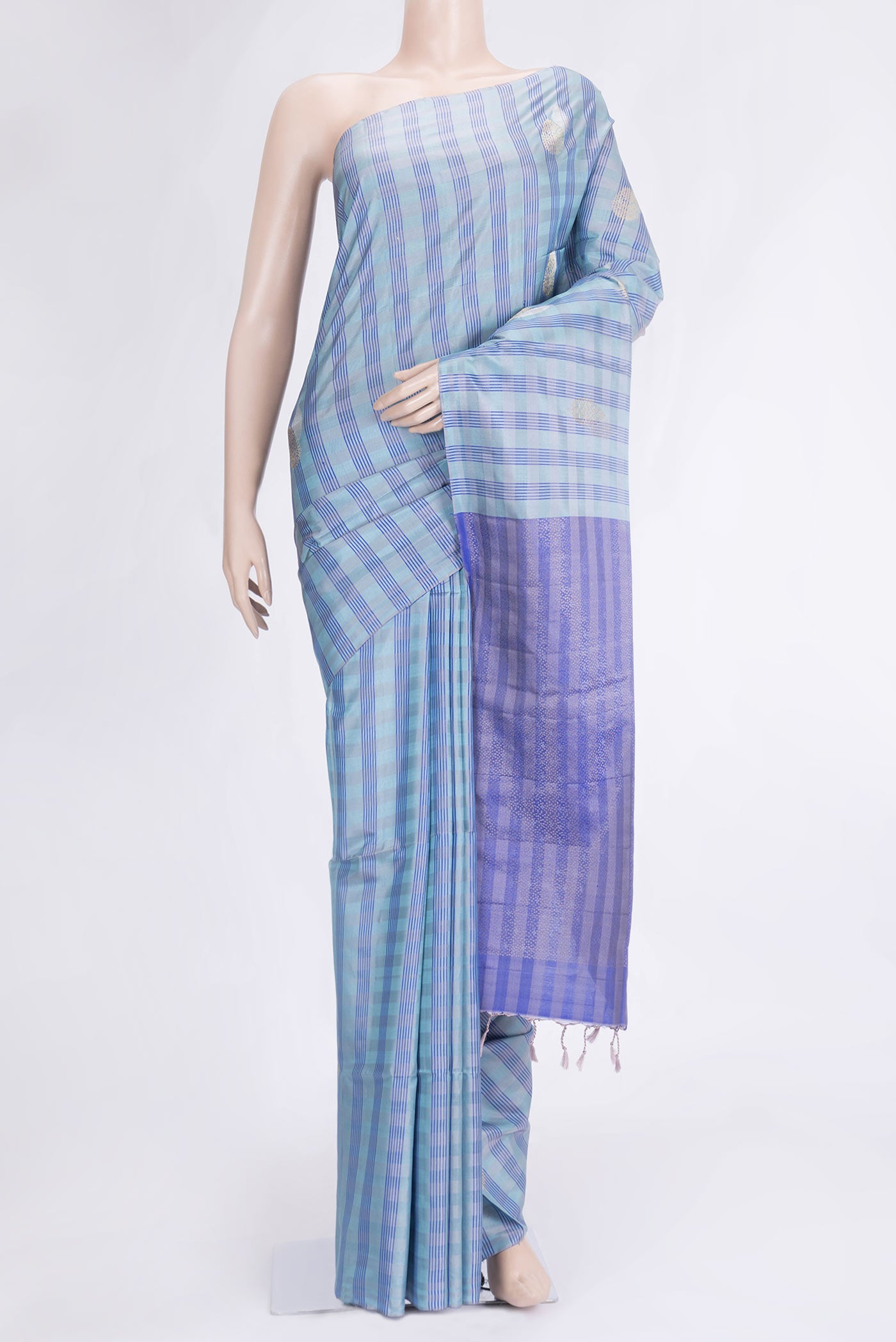 Sky Blue Dual Tone Soft Silk Saree with Checked design on the body and Without Border.  displayed on a mannequin