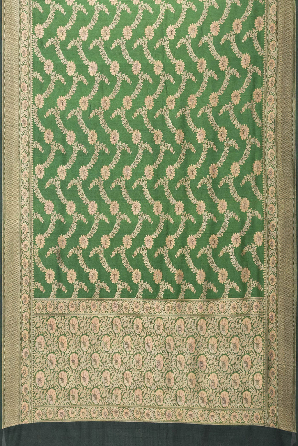 Flat view of Bottle Green Dual Tone Tussar Silk Saree with Zari Brocade on the body and Zari Border. 