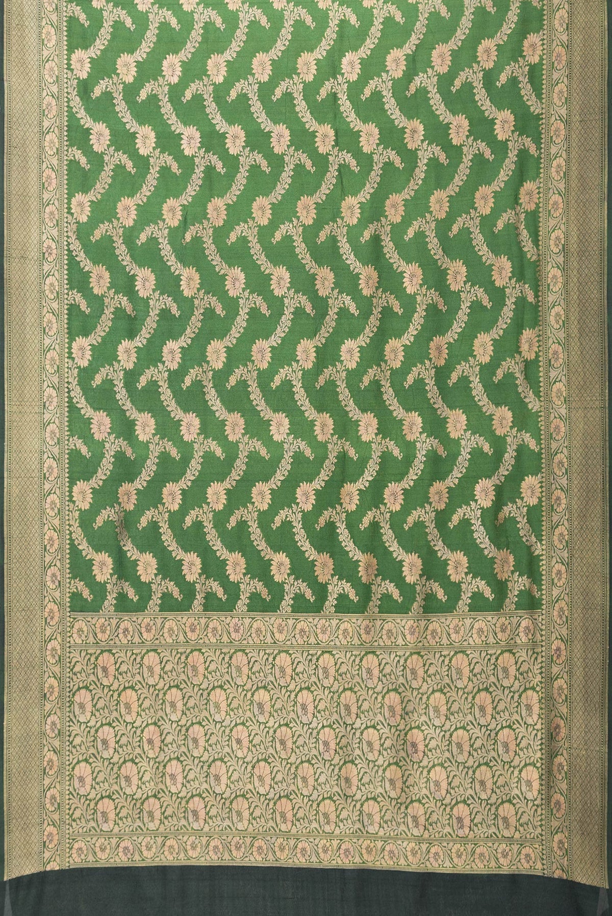 Flat view of Bottle Green Dual Tone Tussar Silk Saree with Zari Brocade on the body and Zari Border. 