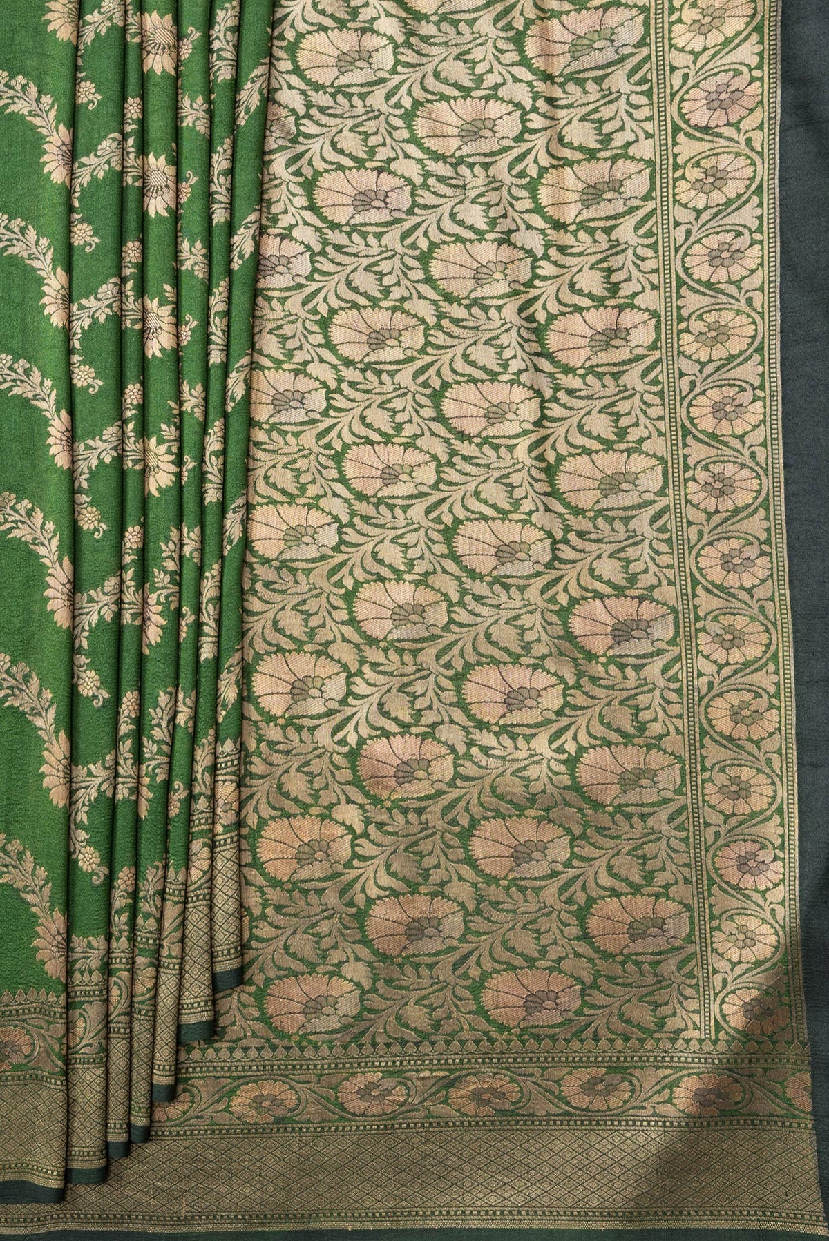 Pleats and pallu of Bottle Green Dual Tone Tussar Silk Saree with Zari Brocade on the body and Zari Border. 