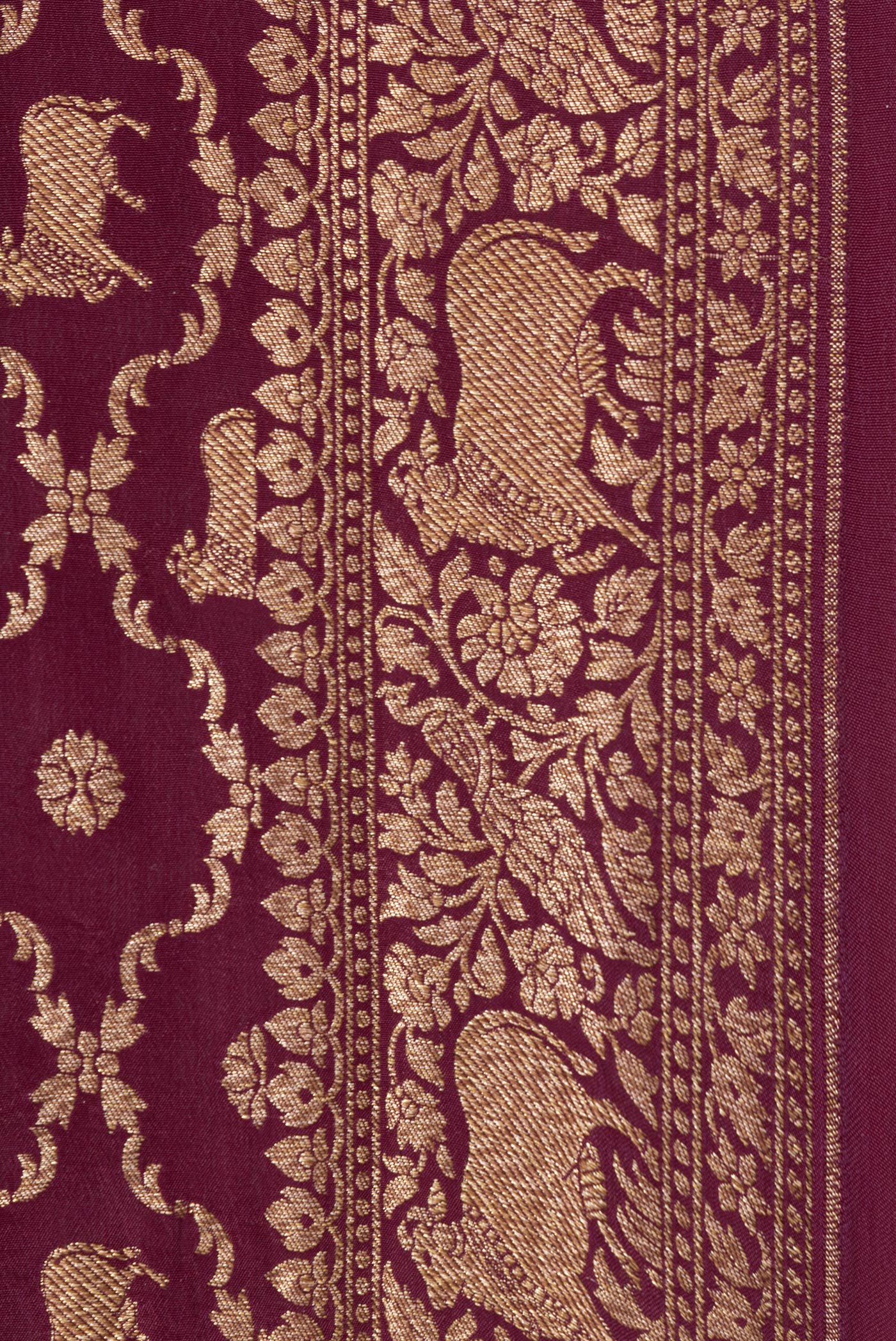 Border image of Maroon Dual Tone Banarasi Georgette Saree with Zari Brocade on the body and Zari Border. 