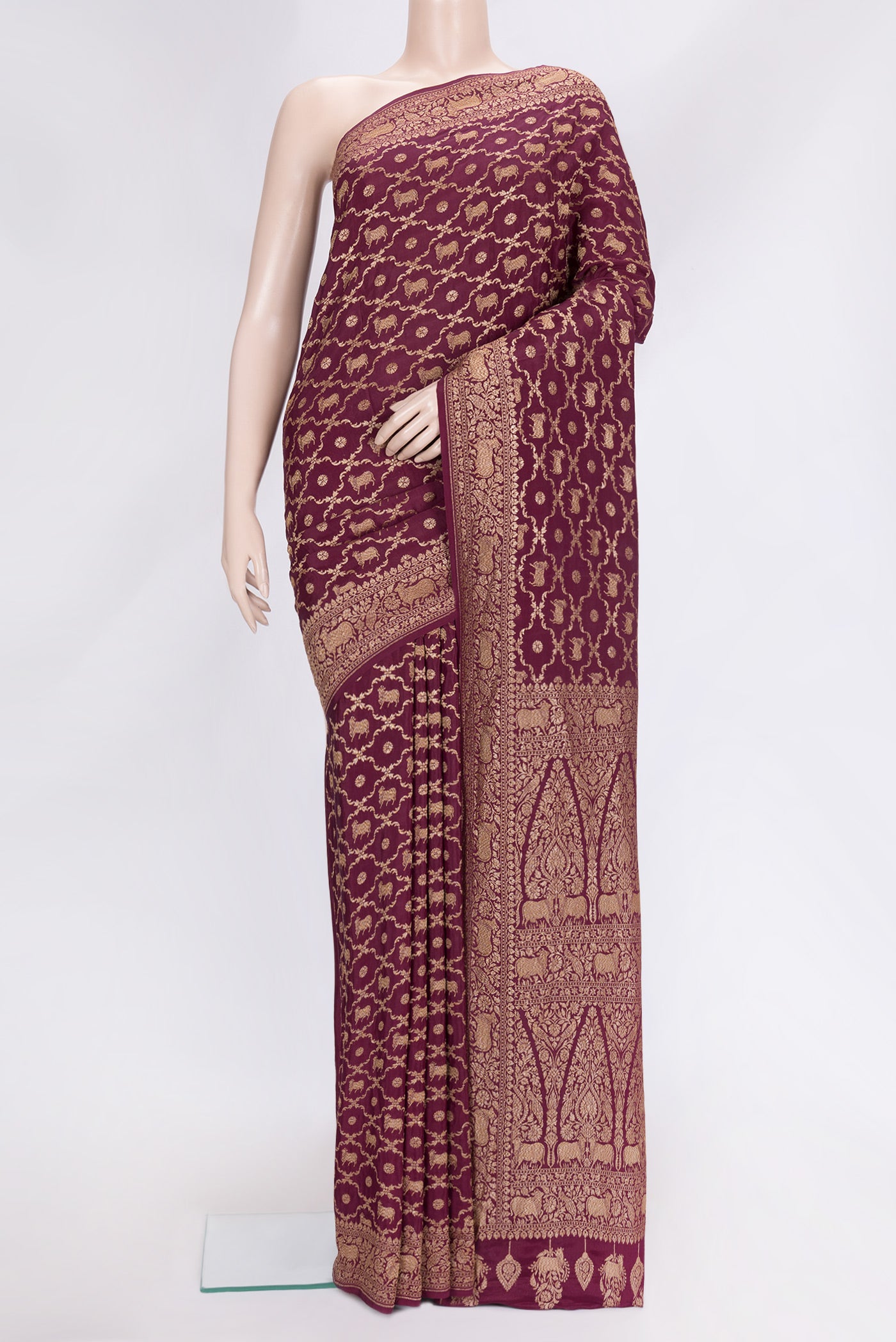 Maroon Dual Tone Banarasi Georgette Saree with Zari Brocade on the body and Zari Border.  displayed on a mannequin