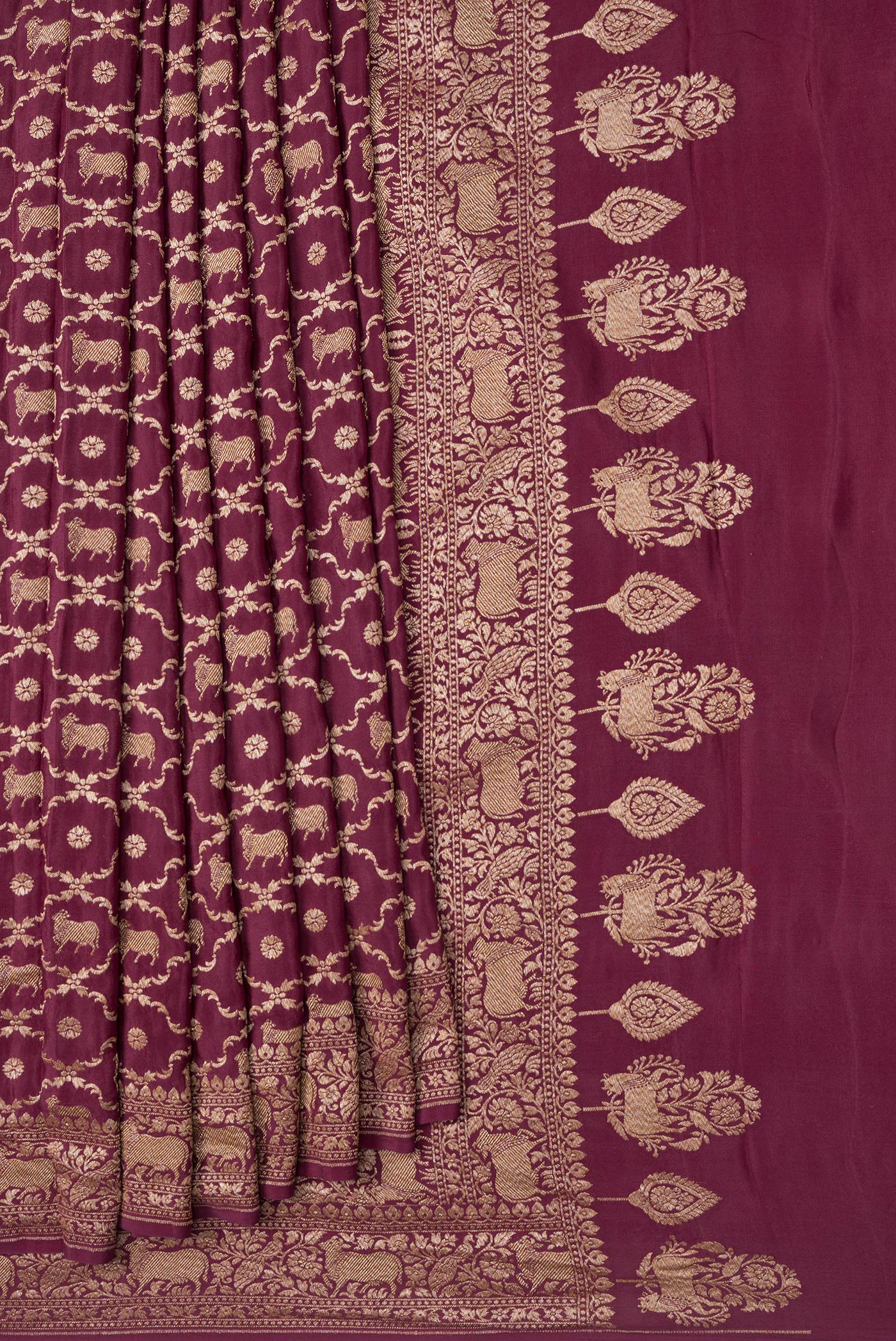 Pleats and pallu of Maroon Dual Tone Banarasi Georgette Saree with Zari Brocade on the body and Zari Border. 