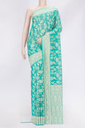 Sea Green Dual Tone Banarasi Georgette Saree with Zari Brocade on the body and Zari Border.  displayed on a mannequin