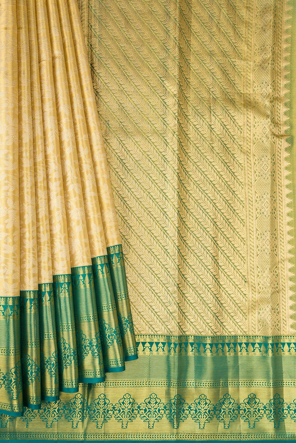 Pleats and pallu of Gold Dual Tone Kanjivaram Tissue Silk Saree with Zari Brocade on the body and Fancy Border. 