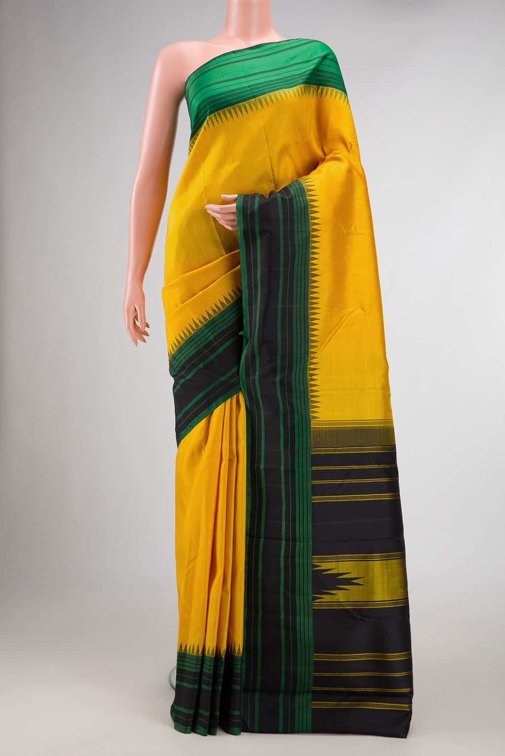 Mustard Dual Tone Kanchipuram Silk Saree with Plain Body and Thread Border displayed on a mannequin