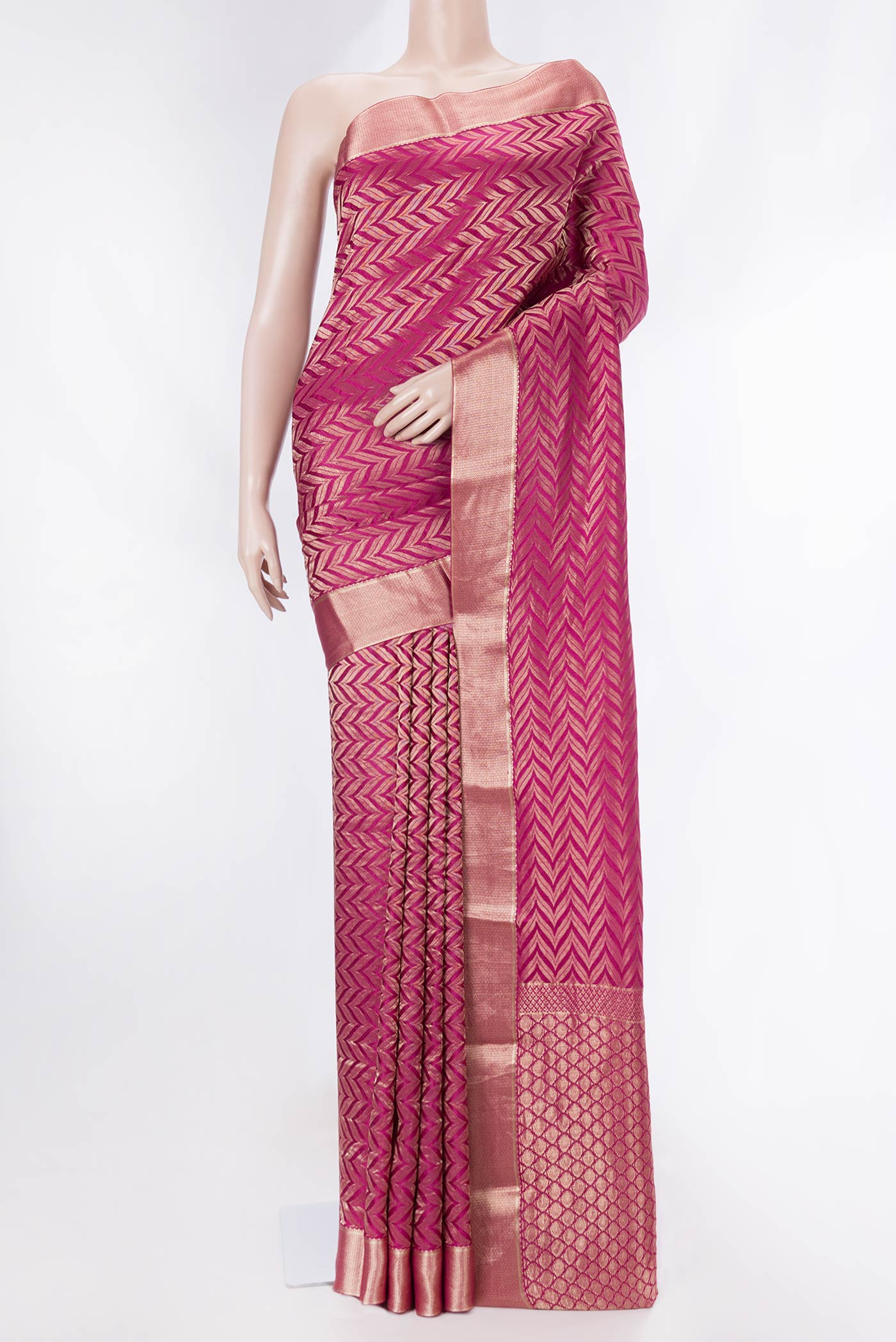 Light Magenta Mysore Crepe Saree with Zari Brocade on the body and Zari Border displayed on a mannequin