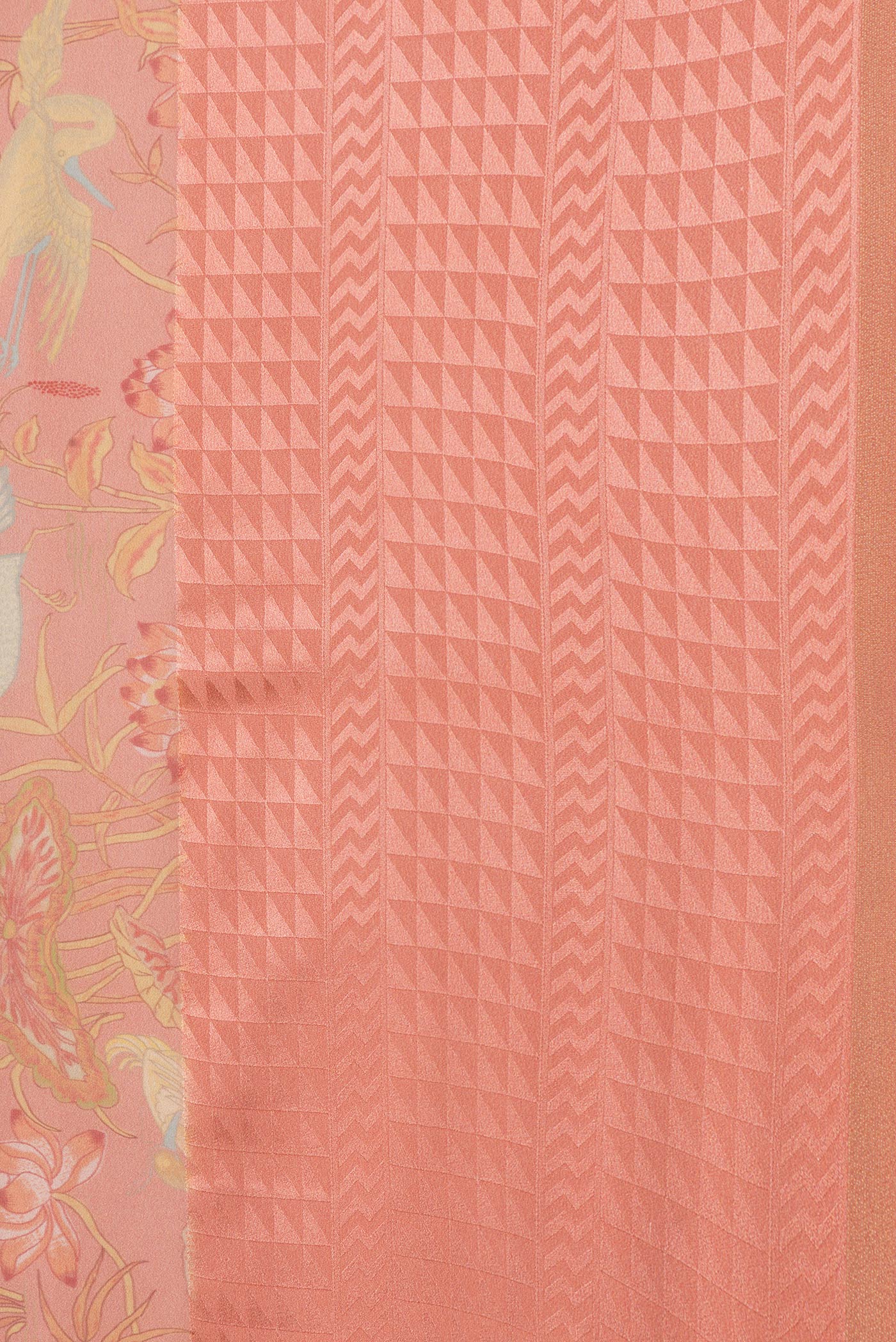 Border image of Peach Dual Tone Georgette Saree with Printed design on the body and Zari Border. 