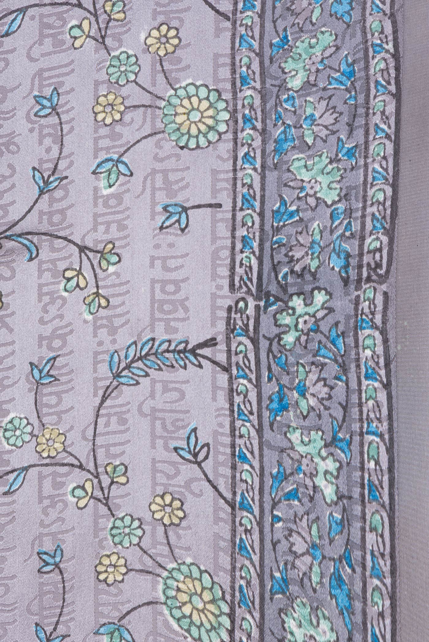 Border image of Grey Dual Tone Mysore Georgette Saree with Printed design on the body and Printed Border. 