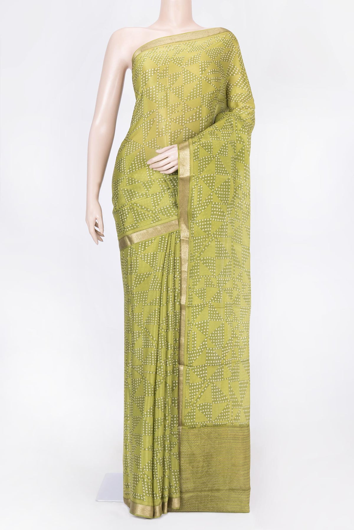 Green Mysore Crepe Saree with Printed design on the body and Zari Border displayed on a mannequin