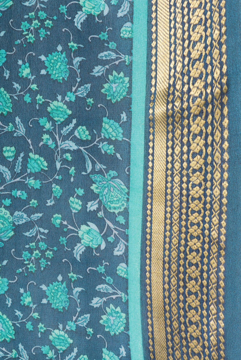 Border image of Peacock Blue Dual Tone Mysore Crepe Saree with Printed design on the body and Zari Border. 