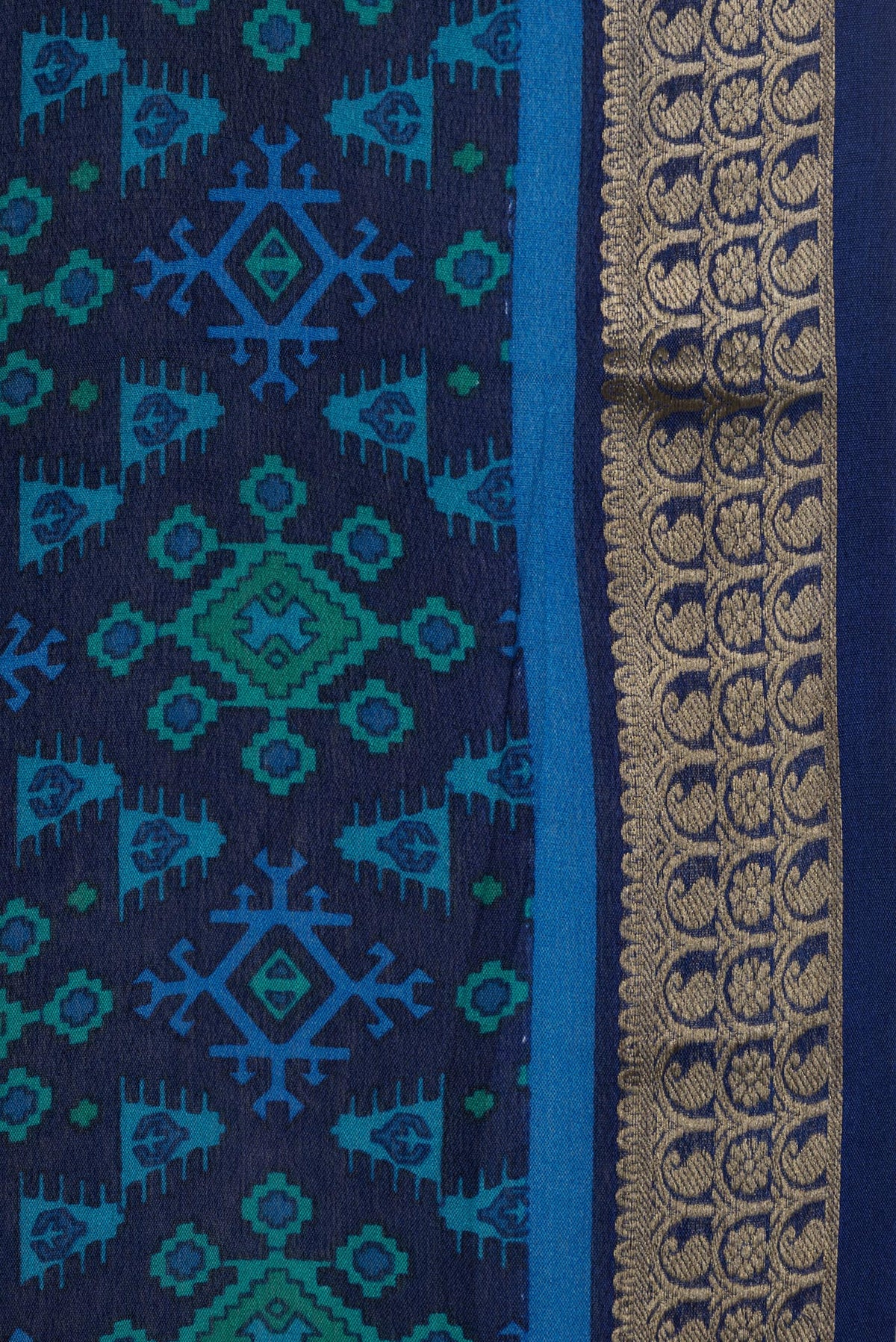 Border image of Navy Blue Dual Tone Crepe Saree with Printed design on the body and Zari Border. 