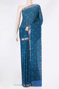 Navy Blue Dual Tone Crepe Saree with Printed design on the body and Zari Border.  displayed on a mannequin