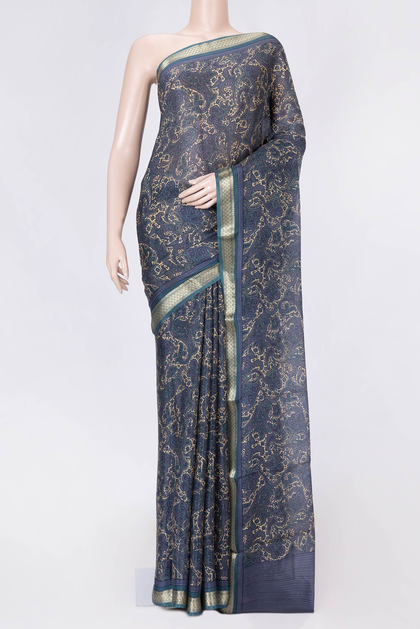 Blue Grey Dual Tone Mysore Crepe Saree with Printed design on the body and Zari Border displayed on a mannequin