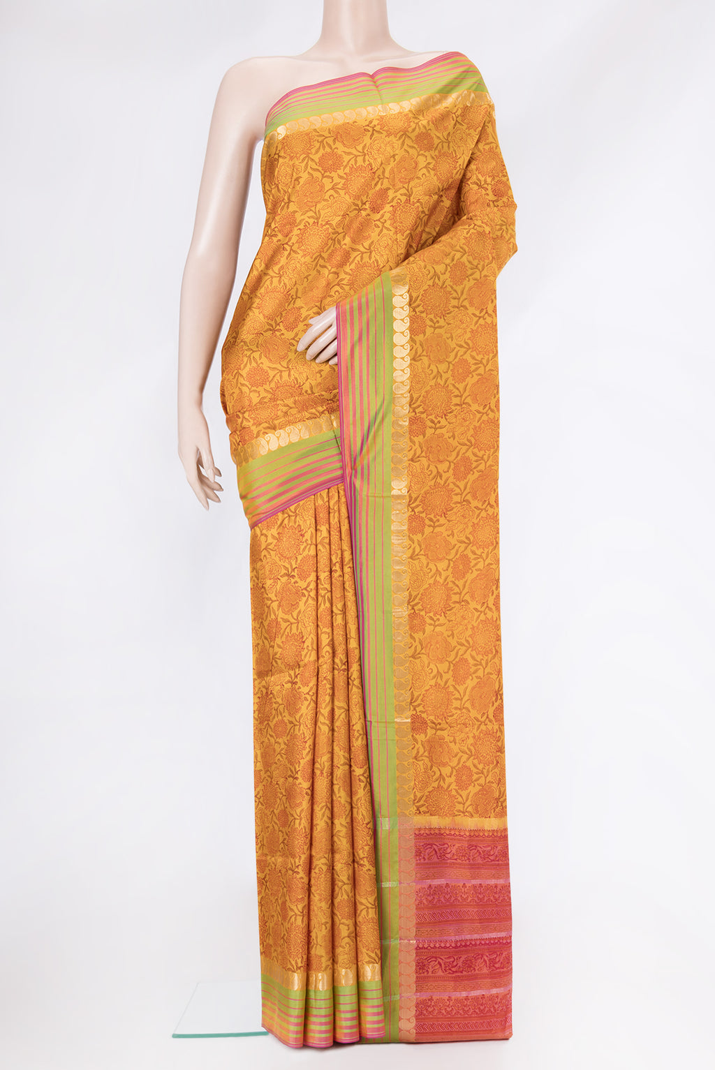 Mustard Dual Tone Kanchipuram Silk Saree with Printed design on the body and Zari Border.  displayed on a mannequin