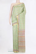 Pure Silk Pista Green Dual Tone Kanchipuram Saree with Printed design on the body and Zari Border.  displayed on a mannequin