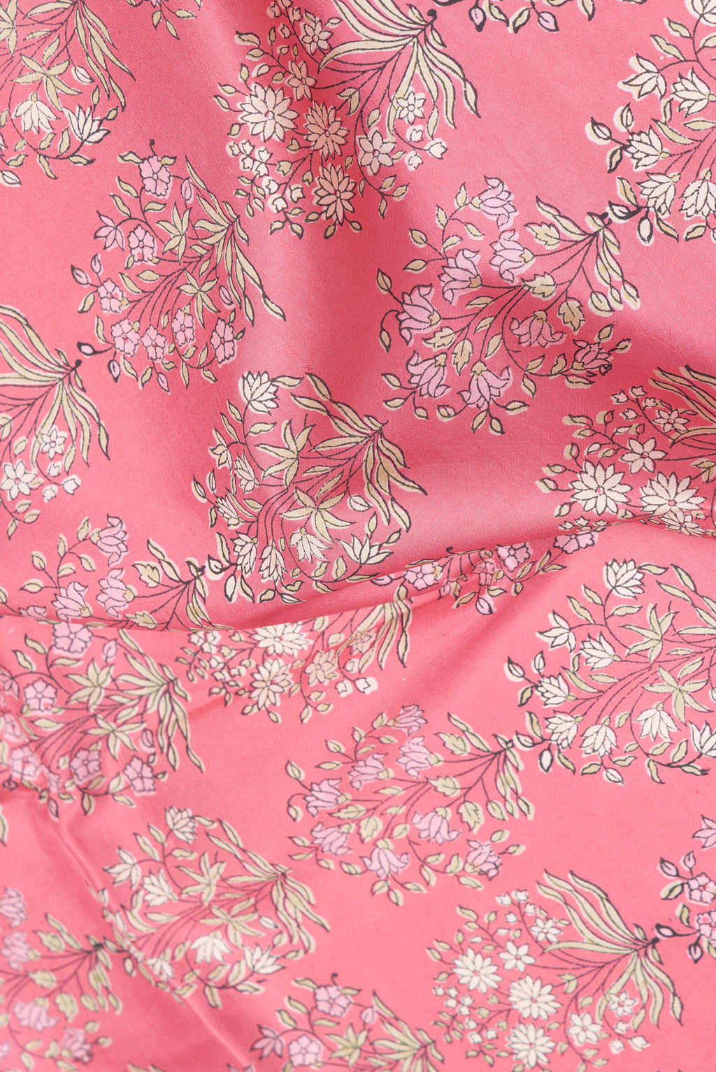 Close up of Pink Dual Tone Kanchipuram Silk Saree with Printed design on the body and Zari Border.  displaying folds