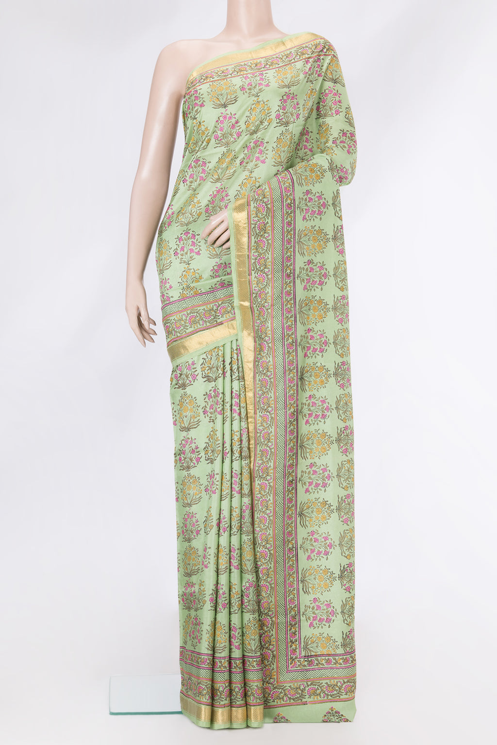 Light Green Dual Tone Kanchipuram Silk Saree with Printed design on the body and Zari Border.  displayed on a mannequin
