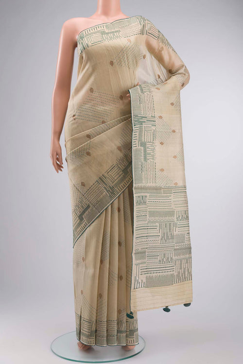 Beige Bhagalpuri Tussar Silk Saree with Zari Butta on the body and Embroidery Border displayed on a mannequin