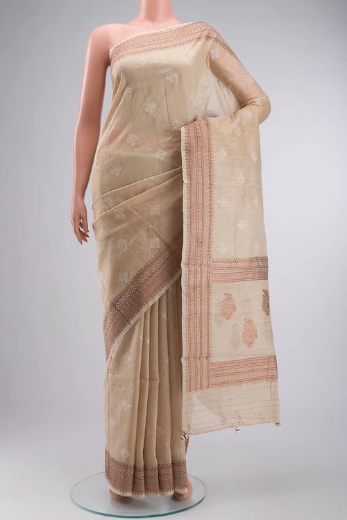 Beige Bhagalpuri Tussar Silk Saree with Embroidery on the body and Zari Border displayed on a mannequin