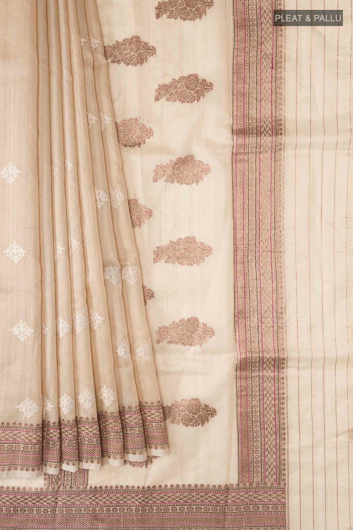 Pleats and pallu of Beige Bhagalpuri Tussar Silk Saree with Embroidery on the body and Zari Border
