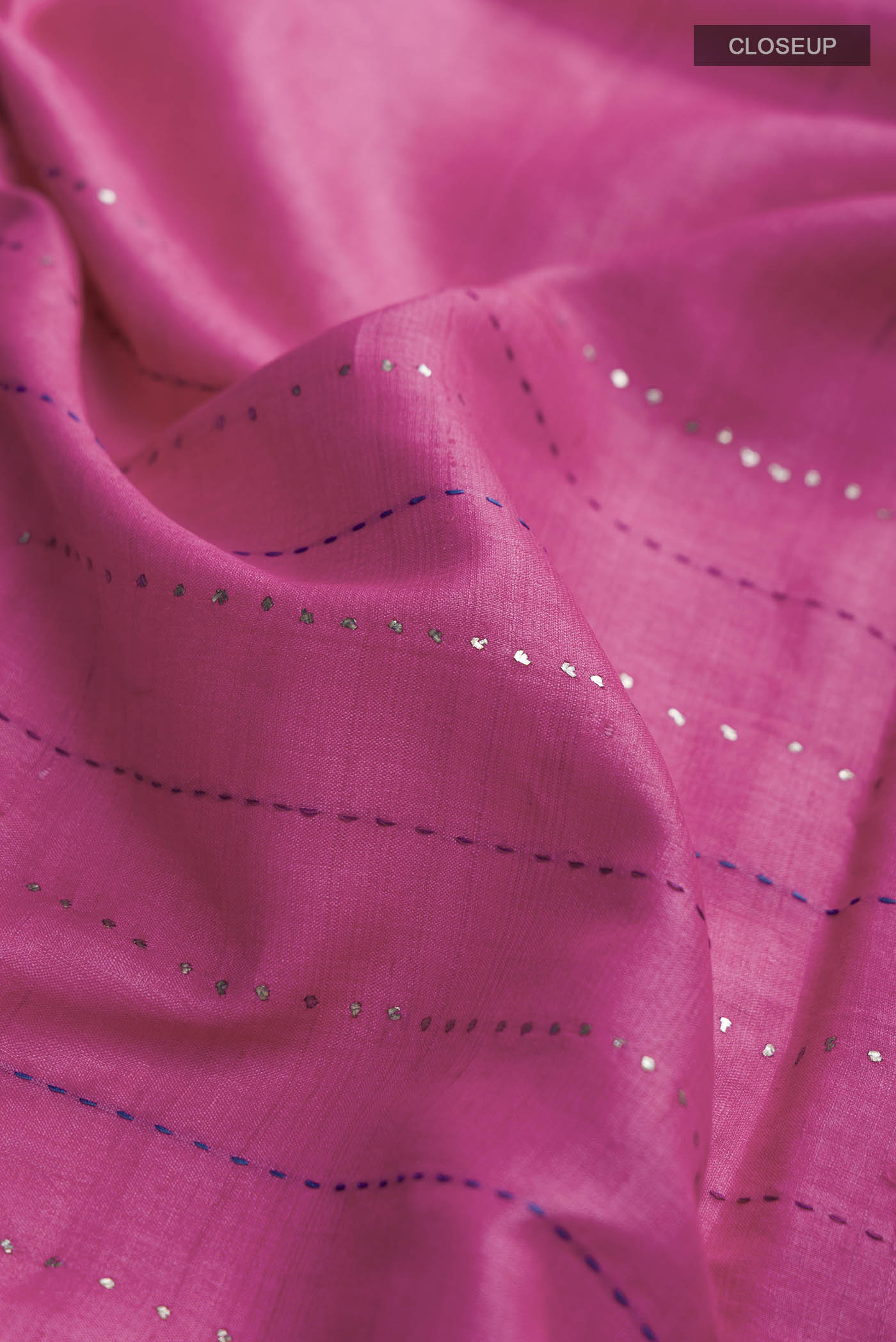 Close up of Pink Bhagalpuri Tussar Silk Saree with Embroidery on the body and Embroidery Border displaying folds
