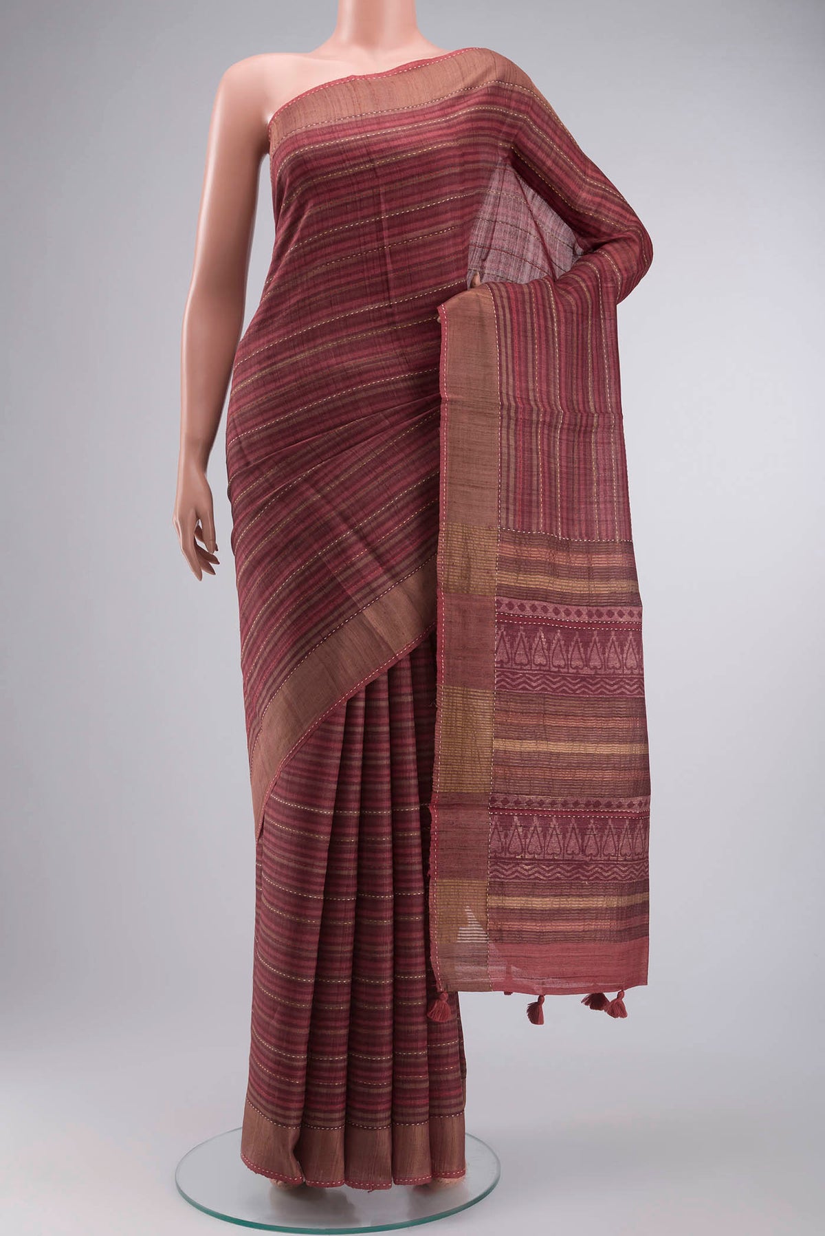 Maroon Bhagalpuri Tussar Silk Saree with Embroidery on the body and Zari Border displayed on a mannequin