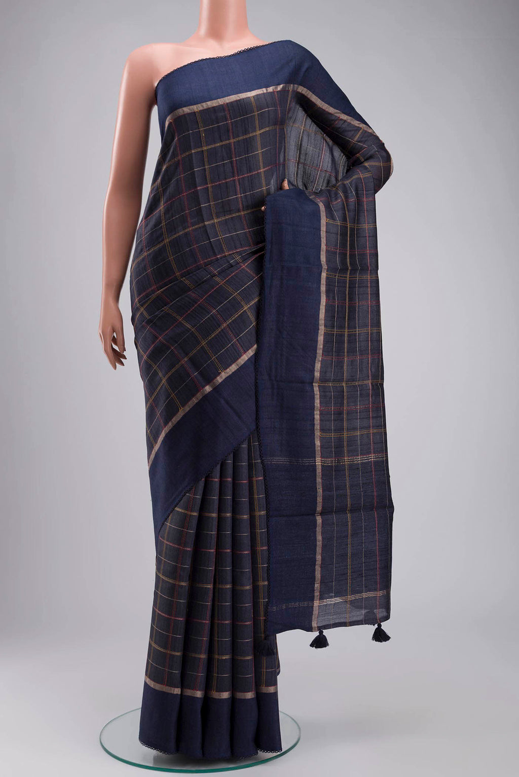Blue Bhagalpuri Tussar Silk Saree with Checked design on the body and Embroidery Border displayed on a mannequin