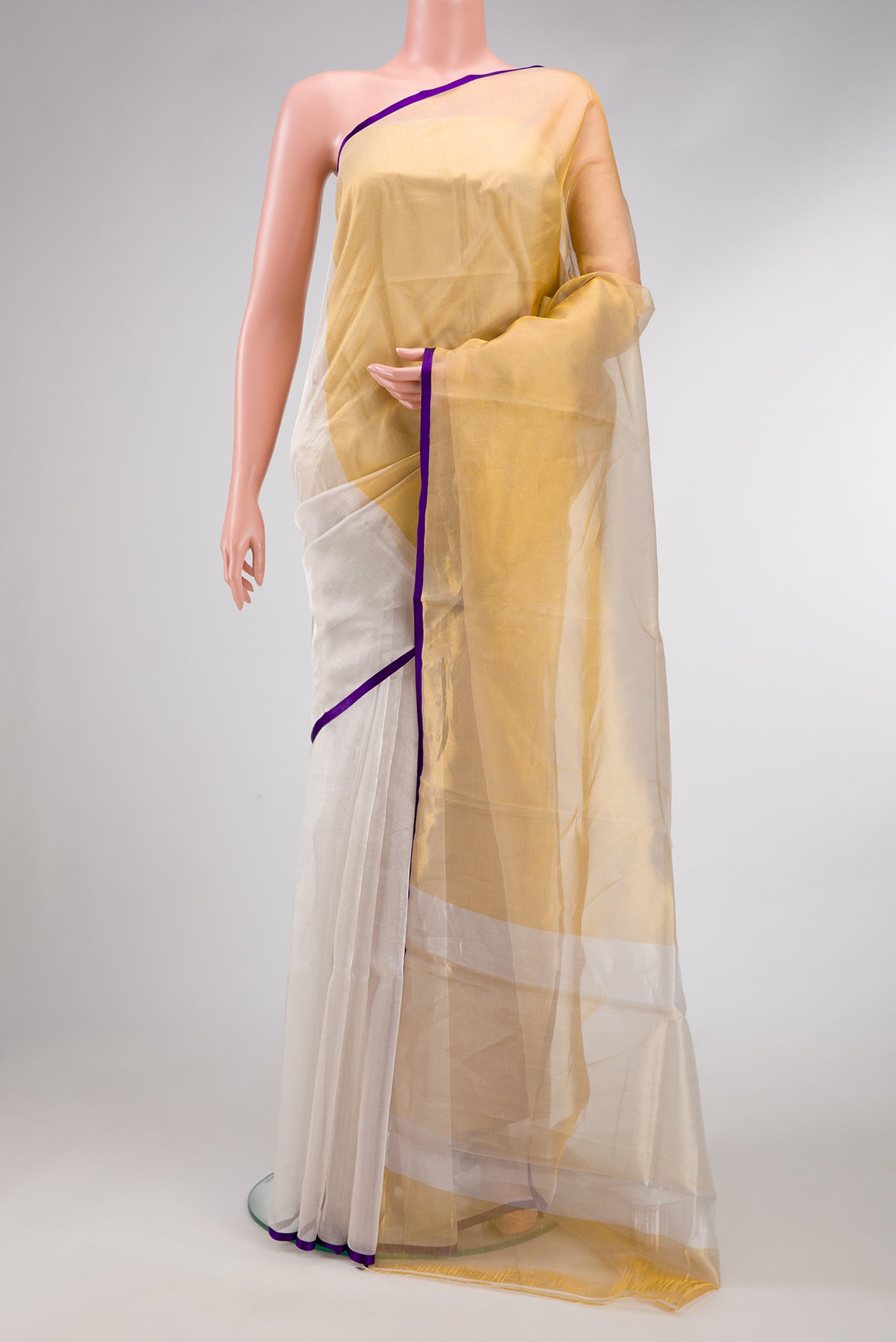 Silver and Gold Color Organza Silk Saree with Plain Body and Plain Border.  displayed on a mannequin