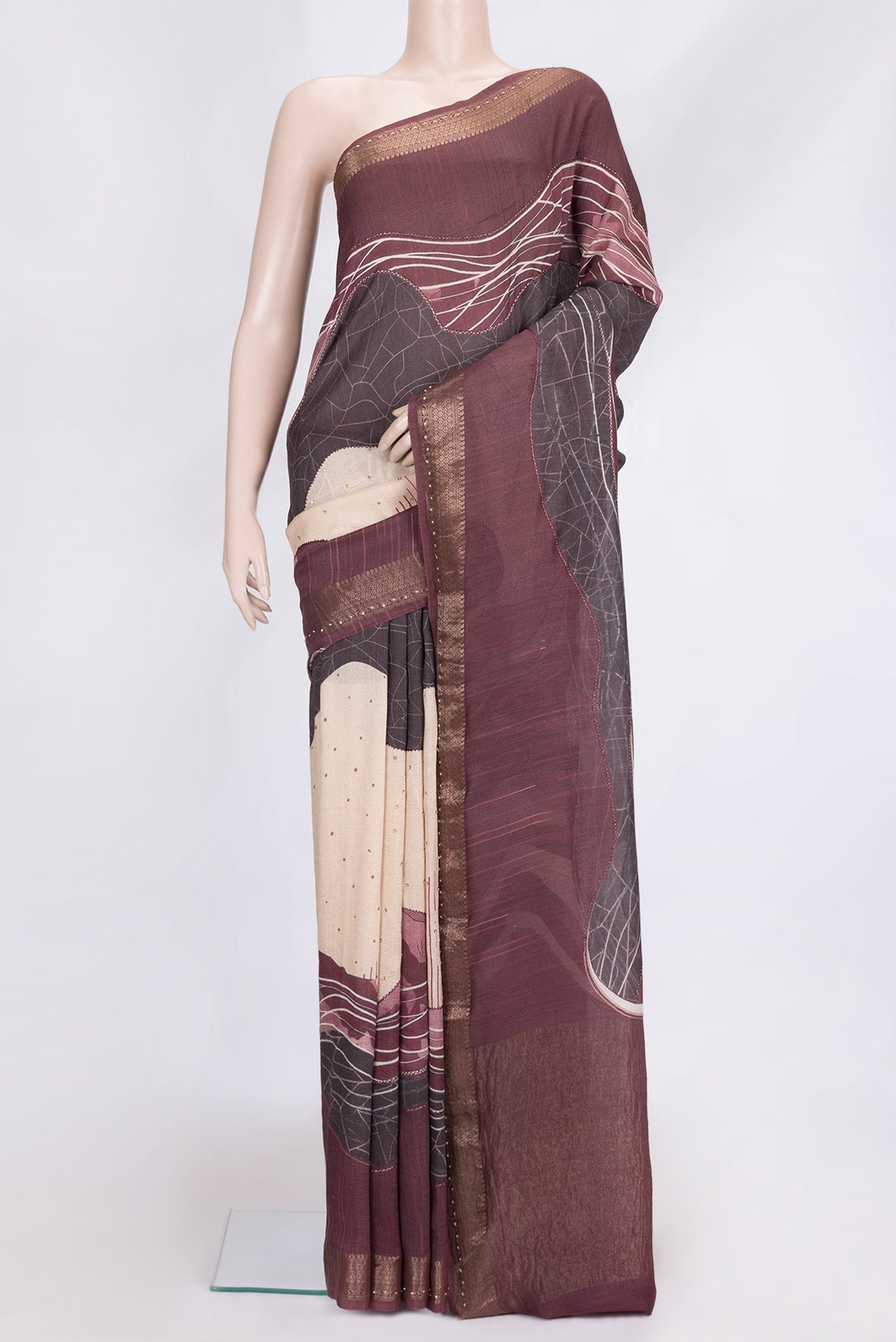 Maroon Dual Tone Tussar Silk Saree with Embroidery on the body and Embroidery Border.  displayed on a mannequin